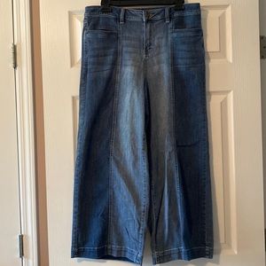 High waisted, flared, cropped blue jeans